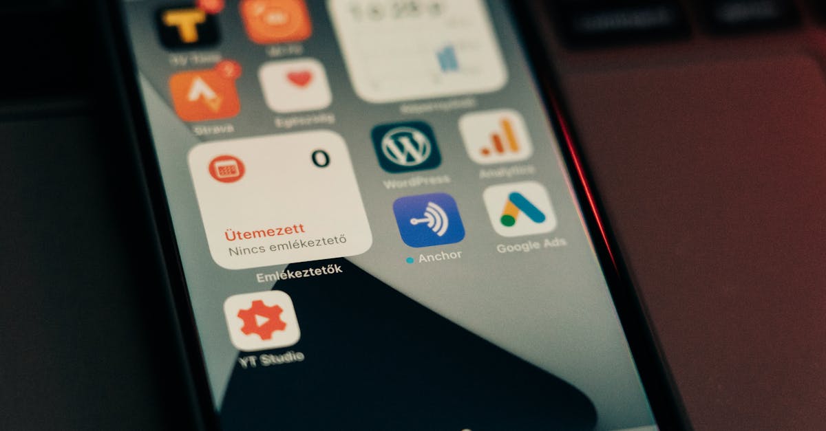 Close-up view of smartphone screen featuring various app icons and notifications.